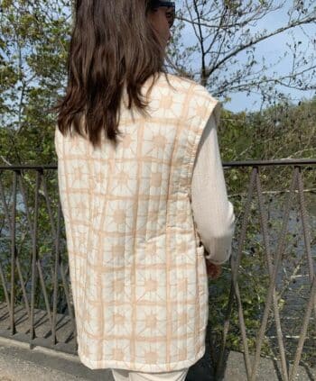 beige sleeveless jacket with back patterns 2