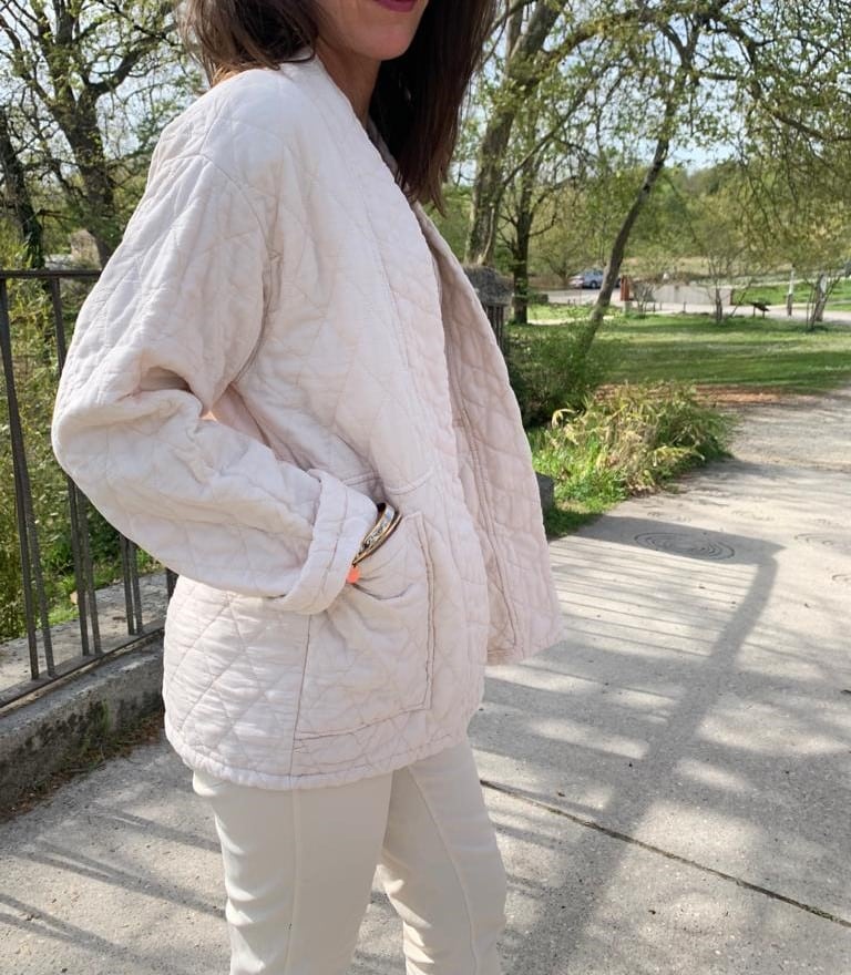 beige quilted jacket with plated pockets and ML