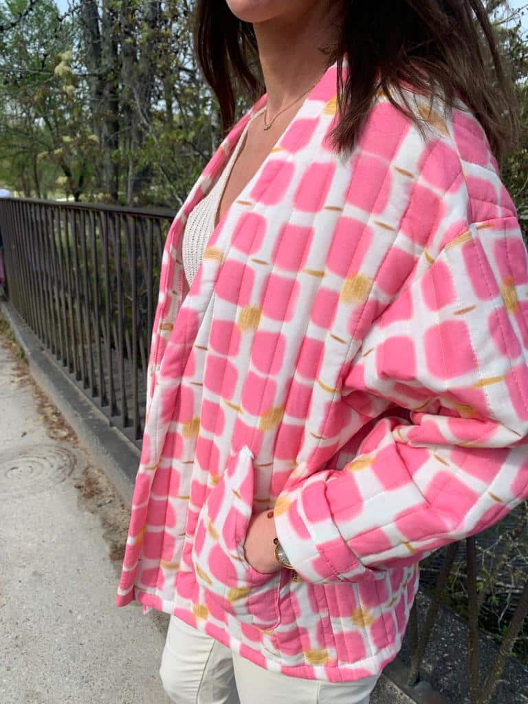 fluorescent pink quilted jacket printed long sleeves and side-plated pockets