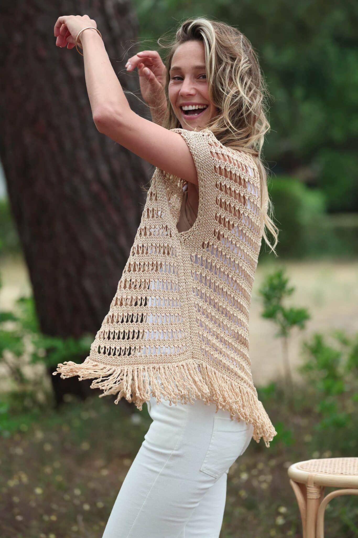 Golden vest with back fringes with white trousers 3