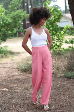 Pink Palazzo pants with white knitted top on Aurelia